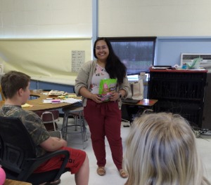 Emily Davis presenting a lesson to fifth grade students.